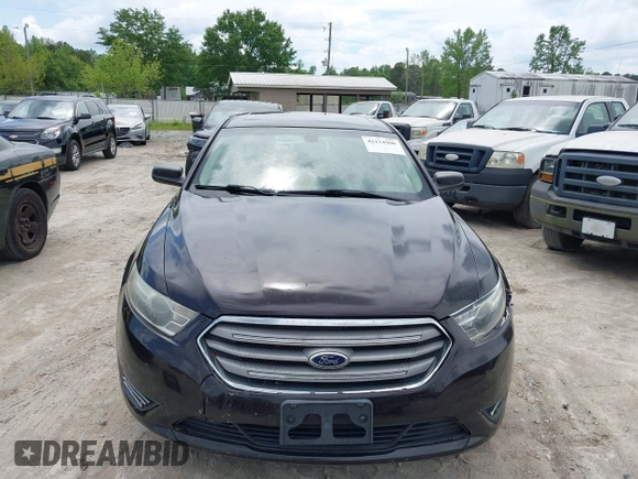2014 Ford Taurus SE z VIN 1FAHP2D81EG140072, wystawiony jako IAAI lot #42124900 z przebiegiem 116 560 mil mil oraz . Historia ofert i sprzedaży dostępna na DreamBid. Obrazek 12.