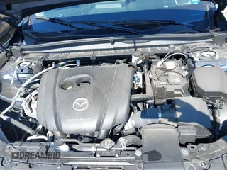 2024 Mazda CX-50 S Preferred with VIN 7MMVABBM3RN233207, listed as a IAAI auction lot 42395310 with 7,544 mi miles and . Bid and sale history available at DreamBid. Image 10.
