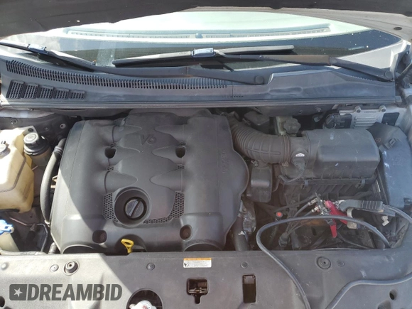2008 Kia Sedona LX with VIN KNDMB233986220663, listed as a Copart auction lot 54321825 with 125,504 mi miles and Salvage Title. Bid and sale history available at DreamBid. Image 12.
