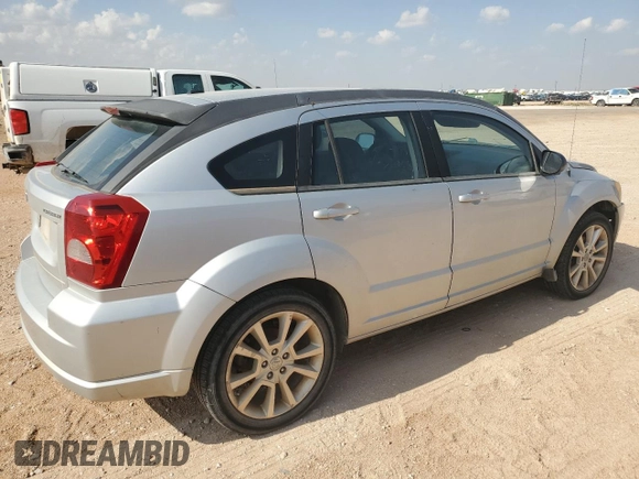 2011 Dodge Caliber Heat z VIN 1B3CB5HA7BD222260, wystawiony jako Copart lot #54451535 z przebiegiem 124 930 mil mil oraz Czysty tytuł • Clean title. Historia ofert i sprzedaży dostępna na DreamBid. Obrazek 3.
