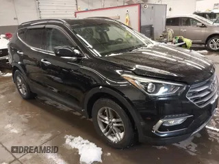 2017 Hyundai Santa Fe 2.4L z VIN 5XYZUDLB6HG415099, wystawiony jako IAAI lot #41608510 z przebiegiem 94 276 mil mil oraz . Historia ofert i sprzedaży dostępna na DreamBid. Obrazek 1.