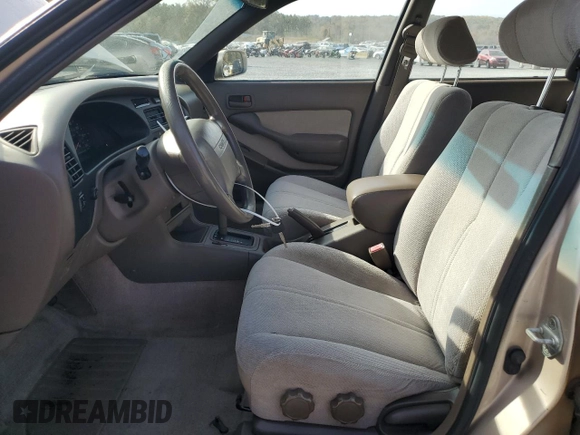 1996 Toyota Camry z VIN 4T1EG12K8TU779386, wystawiony jako Copart lot #79189014 z przebiegiem 142 891 mil mil oraz Czysty tytuł • Clean title. Historia ofert i sprzedaży dostępna na DreamBid. Obrazek 7.