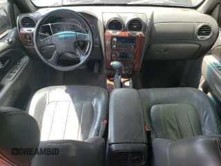 2004 GMC Envoy SLT with VIN 1GKDT13S042281050, listed as a Copart auction lot 60024304 with 267,205 mi miles and Salvage Title. Bid and sale history available at carsss.com. Image 8.