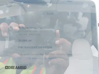 2022 Tesla Model Y Long Range z VIN 7SAYGDEE2NF447998, wystawiony jako IAAI lot #41704968 z przebiegiem 34 088 mil mil oraz . Historia ofert i sprzedaży dostępna na DreamBid. Obrazek 7.