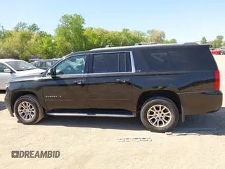 2016 Chevrolet Suburban LTZ with VIN 1GNSKJKC5GR328723, listed as a IAAI auction lot 42253610 with 183,423 mi miles and . Bid and sale history available at DreamBid. Image 14.