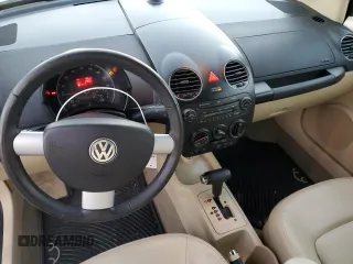 2009 Volkswagen Beetle S with VIN 3VWRF31Y29M409328, listed as a Copart auction lot 87849455 with 69,693 mi miles and Salvage title. Bid and sale history available at DreamBid. Image 8.
