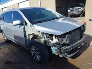 2021 Kia Sedona EX with VIN KNDMB5C11M6664811, listed as a IAAI auction lot 41390328 with 128,568 mi miles. Bid and sale history available at carsss.com. Image 1.