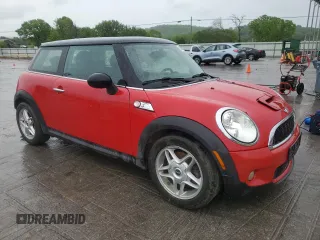 2010 MINI Hardtop S with VIN WMWMF7C50ATZ68936, listed as a Copart auction lot 53692015 with 122,195 mi miles and Salvage Title. Bid and sale history available at DreamBid. Image 4.
