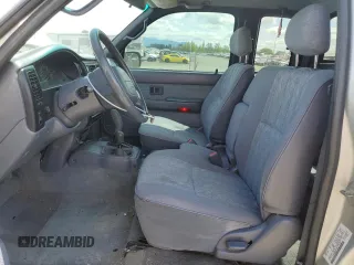 2000 Toyota Tacoma with VIN 5TEWN72N8YZ717707, listed as a Copart auction lot 54479455 with 197,407 mi miles and Salvage title. Bid and sale history available at DreamBid. Image 7.