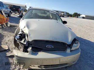 2006 Ford Taurus SE с VIN 1FAFP53U76A221489, выставлен на аукционе Copart как лот 72615374 с пробегом Не указан миль и Списание • Salvage title. История ставок и продаж доступна на DreamBid. Изображение 5.