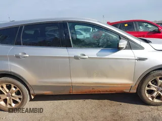 2013 Ford Escape SEL with VIN 1FMCU9H92DUD87086, listed as a IAAI auction lot 41614977 with 100,478 mi miles and . Bid and sale history available at DreamBid. Image 14.