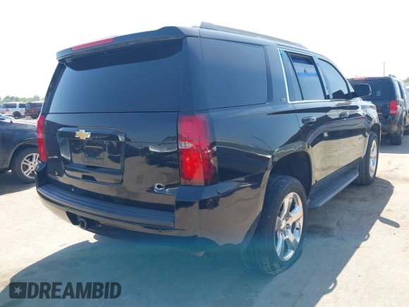 2016 Chevrolet Tahoe LS with VIN 1GNSCAKCXGR482874, listed as a IAAI auction lot 42016639 with 110,744 mi miles and . Bid and sale history available at DreamBid. Image 4.