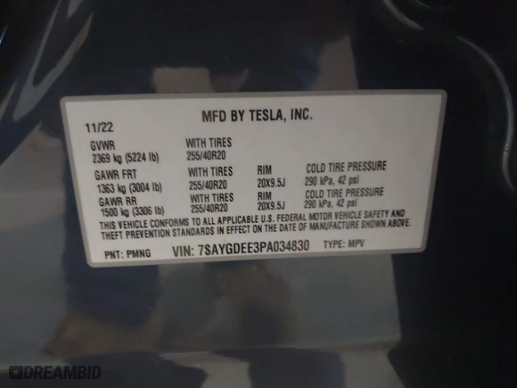2023 Tesla Model Y Long Range with VIN 7SAYGDEE3PA034830, listed as a IAAI auction lot 41351397 with 26,704 mi miles. Bid and sale history available at carsss.com. Image 9.