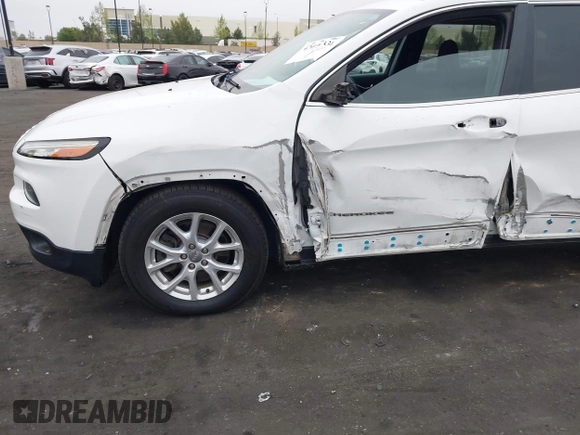 2015 Jeep Cherokee Latitude with VIN 1C4PJLCB0FW761871, listed as a IAAI auction lot 42099336 with 213,049 mi miles and . Bid and sale history available at DreamBid. Image 6.