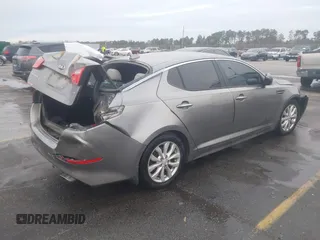 2014 Kia Optima EX z VIN 5XXGN4A75EG290132, wystawiony jako IAAI lot #41292706 z przebiegiem 155 793 mil mil oraz . Historia ofert i sprzedaży dostępna na DreamBid. Obrazek 4.