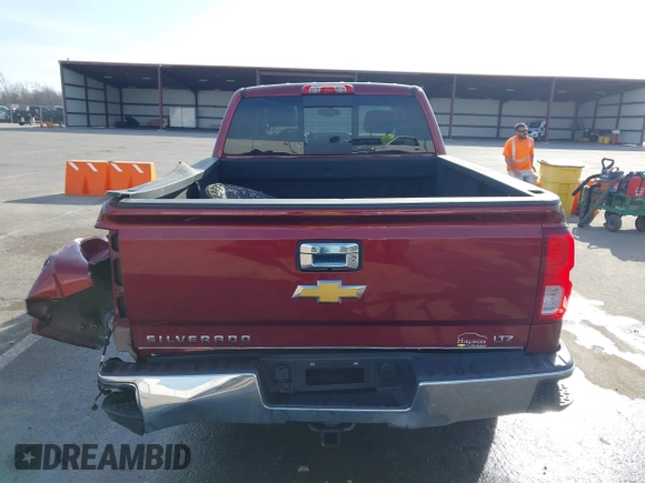 2016 Chevrolet Silverado 1500 LTZ with VIN 3GCUKSEC1GG340855, listed as a IAAI auction lot 41791936 with 142,817 mi miles and . Bid and sale history available at DreamBid. Image 17.