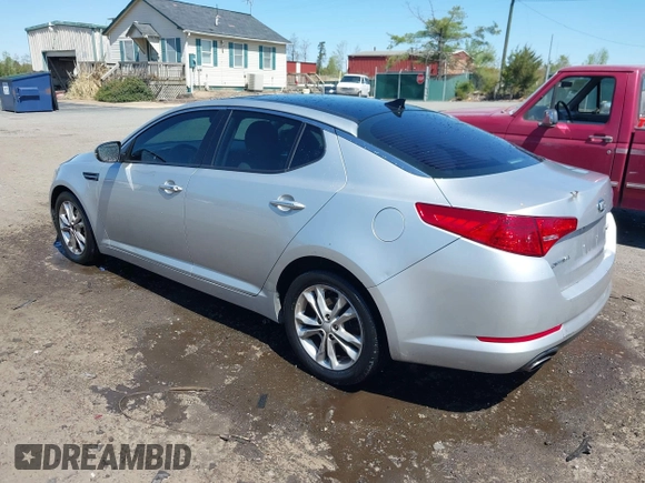 2013 Kia Optima EX with VIN 5XXGN4A73DG108068, listed as a IAAI auction lot 42059774 with 210,179 mi miles and . Bid and sale history available at carsss.com. Image 3.