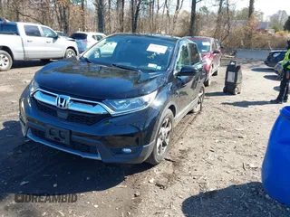 2019 Honda CR-V EX with VIN 2HKRW2H5XKH674504, listed as a IAAI auction lot 41823838 with 104,281 mi miles. Bid and sale history available at carsss.com. Image 17.