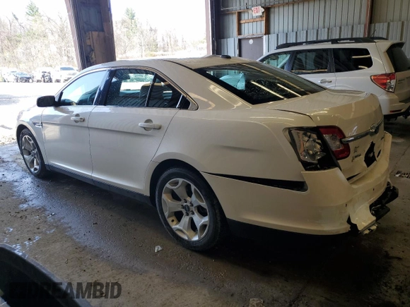 2012 Ford Taurus SEL z VIN 1FAHP2HW8CG133657, wystawiony jako Copart lot #52865895 z przebiegiem 132 876 mil mil oraz Szkoda całkowita • Salvage title. Historia ofert i sprzedaży dostępna na DreamBid. Obrazek 2.