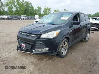 2014 Ford Escape SE z VIN 1FMCU9G9XEUA15367, wystawiony jako IAAI lot #42358528 z przebiegiem 145 994 mil mil oraz . Historia ofert i sprzedaży dostępna na DreamBid. Obrazek 17.