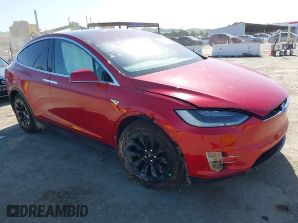 2016 Tesla Model X 70D z VIN 5YJXCAE27GF021994, wystawiony jako IAAI lot #41976475 z przebiegiem 70 771 mil mil oraz . Historia ofert i sprzedaży dostępna na DreamBid. Obrazek 1.