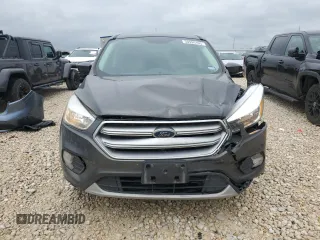 2017 Ford Escape SE with VIN 1FMCU0G98HUE35046, listed as a Copart auction lot 50996105 with 60,765 mi miles and Salvage Title. Bid and sale history available at DreamBid. Image 5.