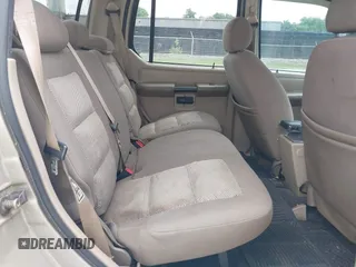 2004 Ford Explorer Sport Trac XLS z VIN 1FMZU67K04UA43558, wystawiony jako IAAI lot #42124644 z przebiegiem 270 550 mil mil oraz . Historia ofert i sprzedaży dostępna na DreamBid. Obrazek 8.