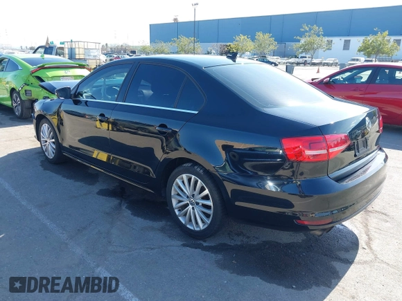 2015 Volkswagen Jetta Sedan 1.8T SE w/Connectivity with VIN 3VWD07AJ6FM354397, listed as a IAAI auction lot 41772983 with 100,265 mi miles. Bid and sale history available at carsss.com. Image 3.