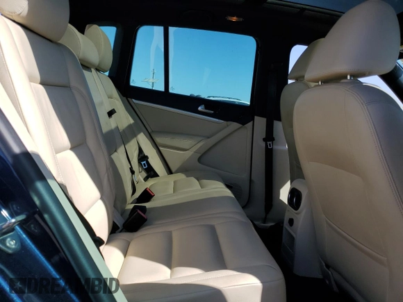 2015 Volkswagen Tiguan SE with VIN WVGAV7AX2FW094359, listed as a Copart auction lot 60101885 with 106,305 mi miles and Salvage title. Bid and sale history available at DreamBid. Image 11.