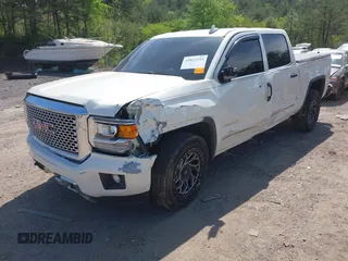 2015 GMC Sierra 1500 Denali with VIN 3GTU2WEJ7FG460695, listed as a IAAI auction lot 42023393 with 116,761 mi miles and . Bid and sale history available at DreamBid. Image 17.