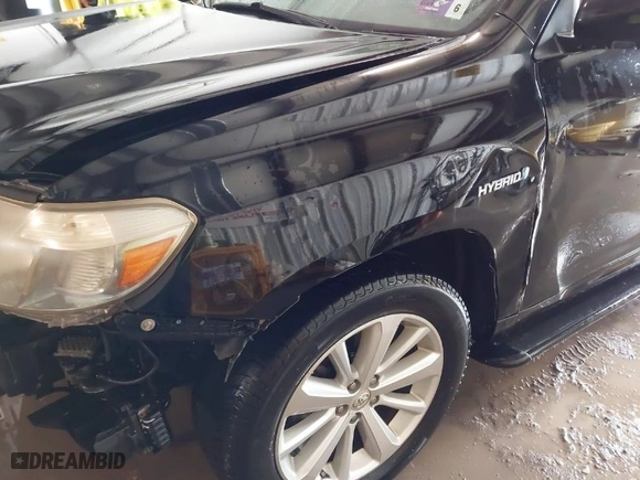 2009 Toyota Highlander Hybrid Limited with VIN JTEEW44A192035643, listed as a IAAI auction lot 41330015 with 200,839 mi miles. Bid and sale history available at carsss.com. Image 19.