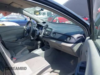 2010 Honda Insight LX with VIN JHMZE2H50AS014165, listed as a IAAI auction lot 42381535 with 169,032 mi miles and . Bid and sale history available at DreamBid. Image 5.