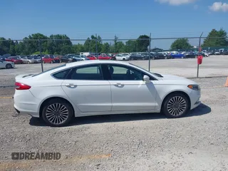 2018 Ford Fusion Titanium with VIN 3FA6P0D98JR134230, listed as a IAAI auction lot 42567084 with 107,459 mi miles and . Bid and sale history available at DreamBid. Image 13.