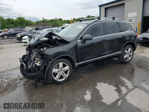 2012 Volkswagen Touareg Sport z VIN WVGEF9BP7CD009824, wystawiony jako Copart lot #58311915 z przebiegiem 154 397 mil mil oraz Szkoda całkowita • Salvage title. Historia ofert i sprzedaży dostępna na DreamBid. Obrazek 1.