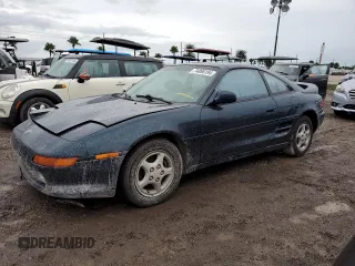 1992 Toyota MR2 z VIN JT2SW22N5N0058195, wystawiony jako Copart lot #74886194 z przebiegiem 158 816 mil mil oraz Nie do naprawy. Historia ofert i sprzedaży dostępna na DreamBid. Obrazek 1.