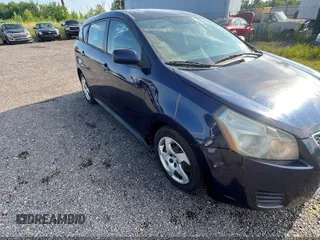 2009 Pontiac Vibe 1SA with VIN 5Y2SP67809Z465552, listed as a IAAI auction lot 42809911 with 148,723 mi miles and . Bid and sale history available at DreamBid. Image 1.