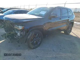 2021 Jeep Grand Cherokee 80th Anniversary with VIN 1C4RJFBG9MC527654, listed as a IAAI auction lot 41212055 with 92,436 mi miles and . Bid and sale history available at DreamBid. Image 17.