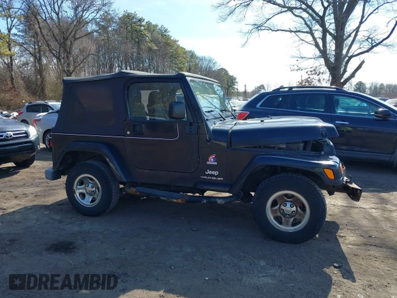 2003 Jeep Wrangler X with VIN 1J4FA39S53P362991, listed as a IAAI auction lot 41607212 with 240,556 mi miles. Bid and sale history available at carsss.com. Image 13.