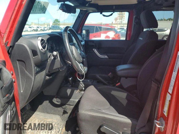 2014 Jeep Wrangler Unlimited Rubicon with VIN 1C4HJWFG5EL162736, listed as a Copart auction lot 64077645 with 126,330 mi miles and Salvage title. Bid and sale history available at DreamBid. Image 7.
