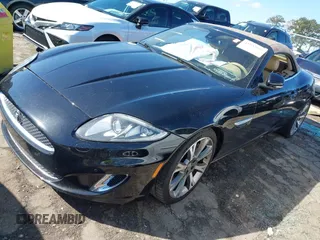 2014 Jaguar XK with VIN SAJWA4GB0ELB52358, listed as a IAAI auction lot 41832850 with 93,037 mi miles. Bid and sale history available at carsss.com. Image 2.