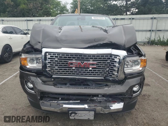 2019 GMC Canyon 4WD Denali with VIN 1GTG6EENXK1200430, listed as a Copart auction lot 65524334 with 54,813 mi miles and Salvage Title. Bid and sale history available at carsss.com. Image 5.