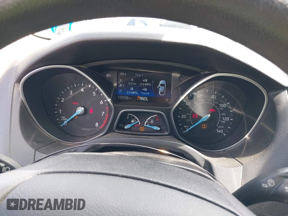 2018 Ford Focus SE with VIN 1FADP3F20JL312395, listed as a IAAI auction lot 42110335 with 110,720 mi miles and . Bid and sale history available at DreamBid. Image 7.