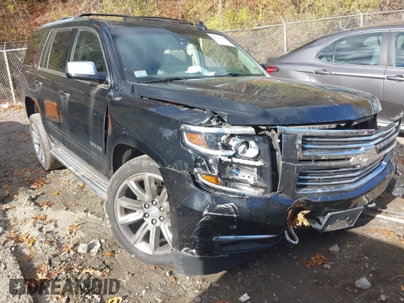 2015 Chevrolet Tahoe LTZ z VIN 1GNSKCKC3FR584689, wystawiony jako IAAI lot #41505580 z przebiegiem 37 012 mil mil oraz . Historia ofert i sprzedaży dostępna na DreamBid. Obrazek 1.