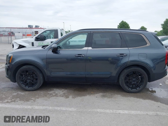 2021 Kia Telluride SX with VIN 5XYP5DHC9MG095972, listed as a IAAI auction lot 42345283 with 125,548 mi miles and . Bid and sale history available at DreamBid. Image 14.
