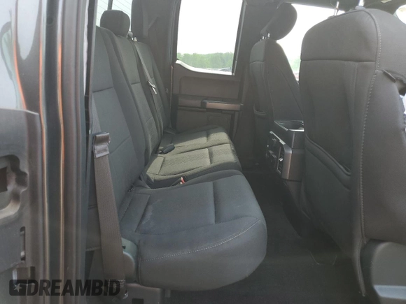 2018 Ford F-150 XL z VIN 1FTFX1EG9JFE34899, wystawiony jako Copart lot #60716205 z przebiegiem 71 187 mil mil oraz Szkoda całkowita • Salvage title. Historia ofert i sprzedaży dostępna na DreamBid. Obrazek 10.