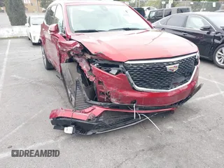 2020 Cadillac XT6 FWD Premium Luxury with VIN 1GYKPCRSXLZ133207, listed as a IAAI auction lot 41733269 with 82,853 mi miles and . Bid and sale history available at DreamBid. Image 6.