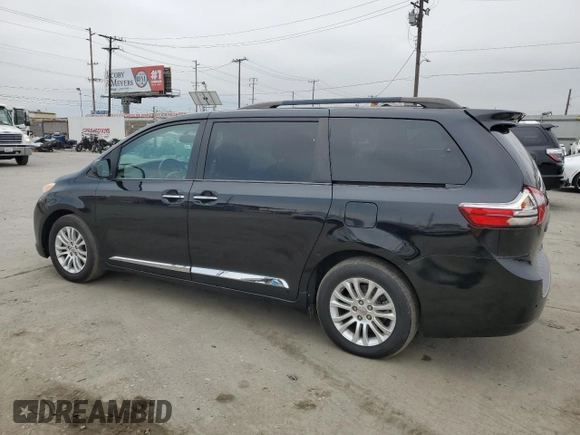 2015 Toyota Sienna XLE с VIN 5TDYK3DC6FS561960, выставлен на аукционе Copart как лот 59607355 с пробегом 110 593 миль миль и Списание • Salvage title. История ставок и продаж доступна на DreamBid. Изображение 2.