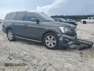 2019 Ford Expedition XLT with VIN 1FMJU1HT7KEA15609, listed as a Copart auction lot 61398885 with 57,092 mi miles and Salvage title. Bid and sale history available at DreamBid. Image 4.