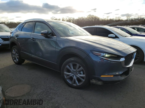 2021 Mazda CX-30 Premium with VIN 3MVDMBDM2MM220739, listed as a Copart auction lot 86848764 with 48,522 mi miles and Salvage title. Bid and sale history available at DreamBid. Image 4.