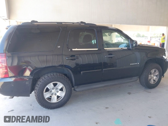 2010 Chevrolet Tahoe LT with VIN 1GNMCBE37AR244756, listed as a IAAI auction lot 42134659 with 205,955 mi miles and . Bid and sale history available at DreamBid. Image 13.